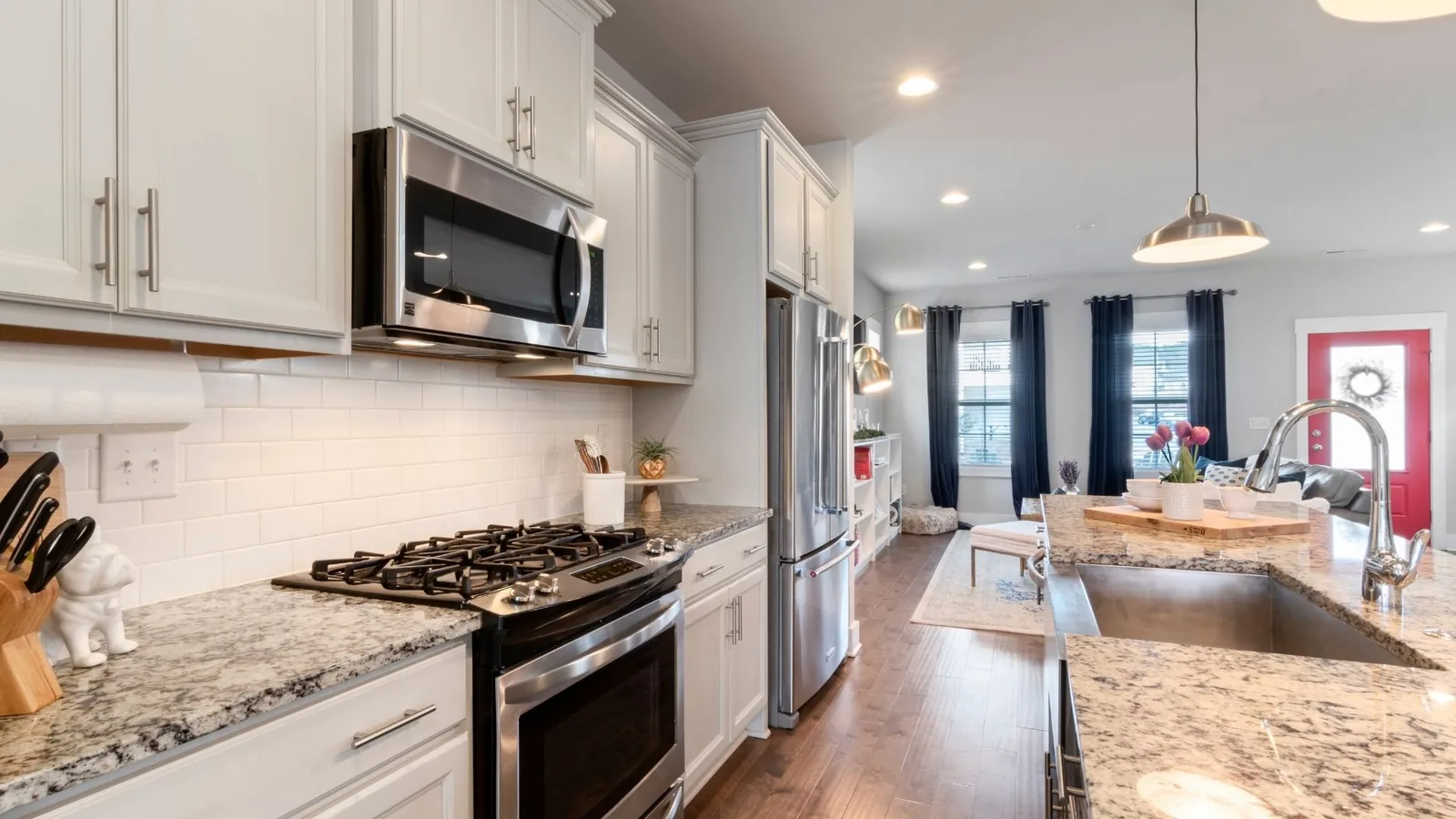 Clean modern kitchen with granite countertops