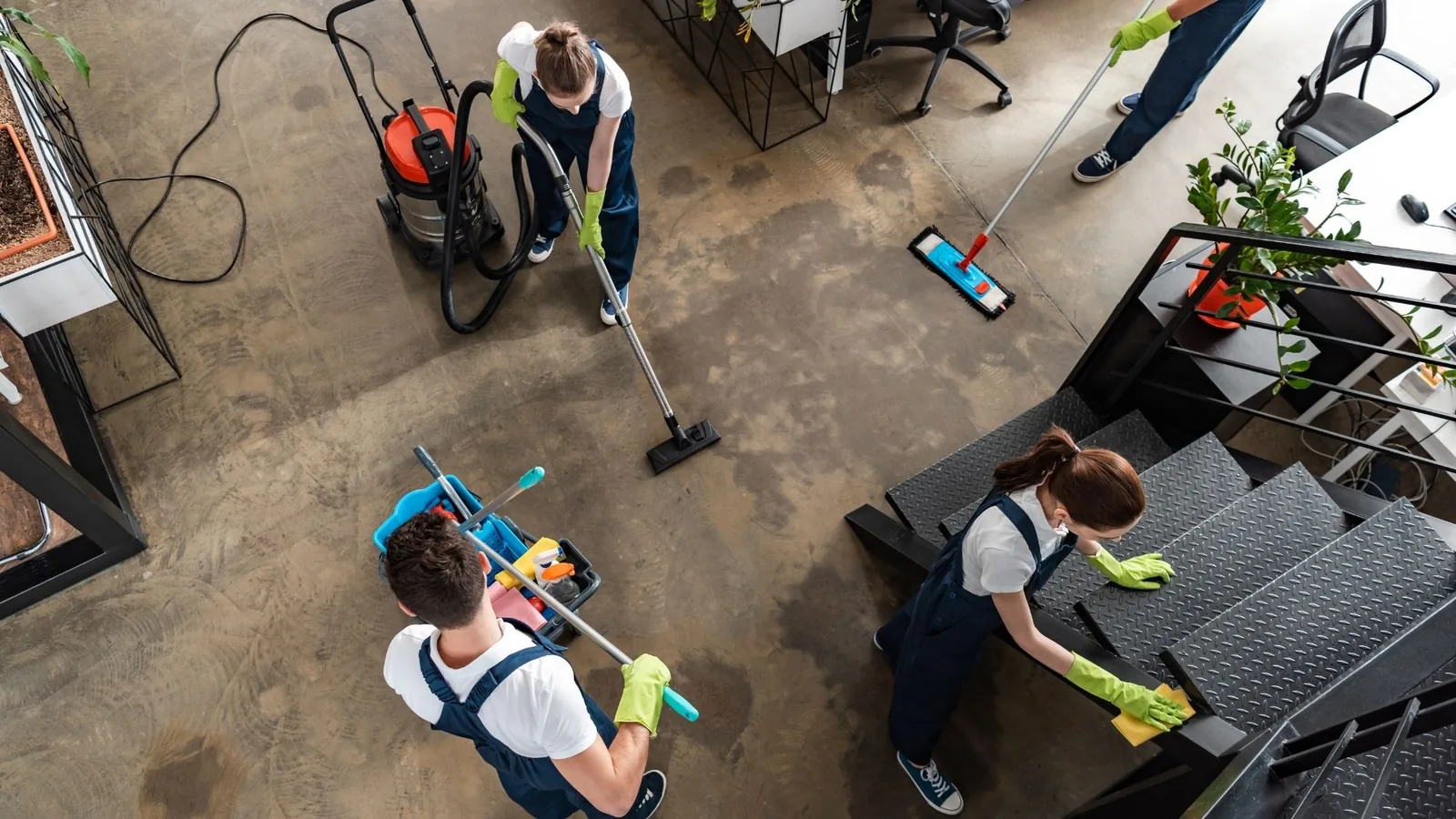 Cleaning team performing commercial floor cleaning